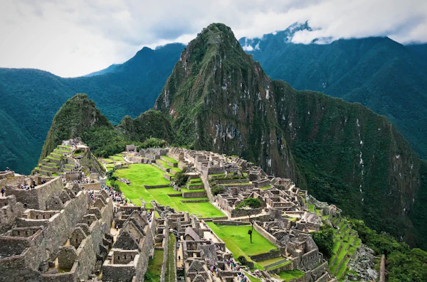 Machu Picchu ruins with Huayna Picchu mountain in the background