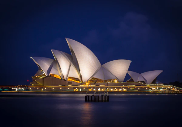 Sydney Opera House on the harbor at golden hour